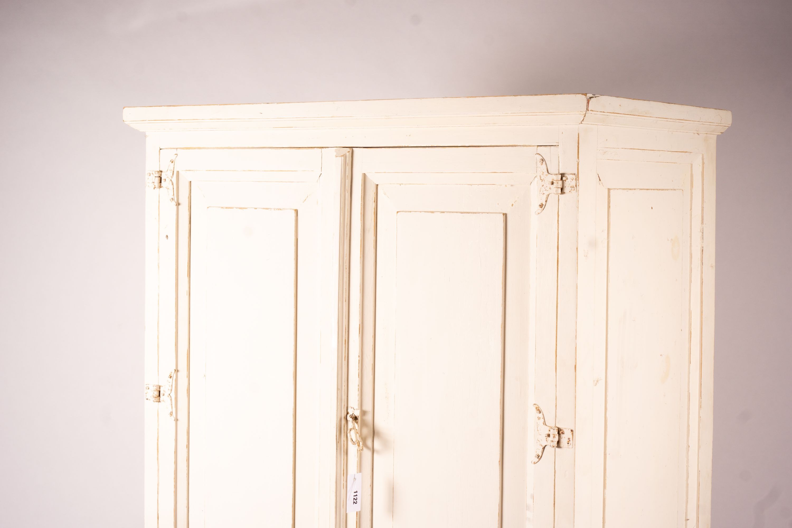 A 19th century Continental painted pine press cupboard, length 105cm, depth 62cm, height 182cm